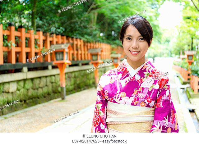 Japanese woman at temple with traditional kimono