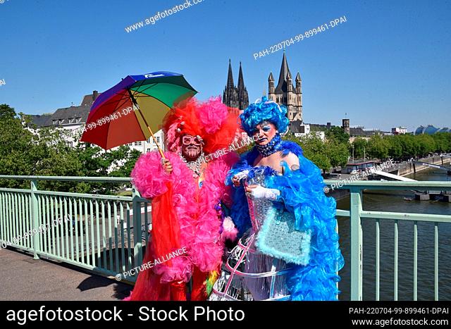 03 July 2022, North Rhine-Westphalia, Cologne: Participants of the Christopher Street Day (CSD) in Cologne. At the parade with this year's motto ""For human...