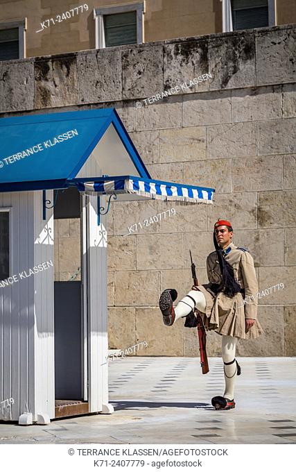 Evzones, an elite Greek army unit guards the Tomb of the Unknown Soldier at the Greek National Parliament near syntagma Square, Athens, Greece
