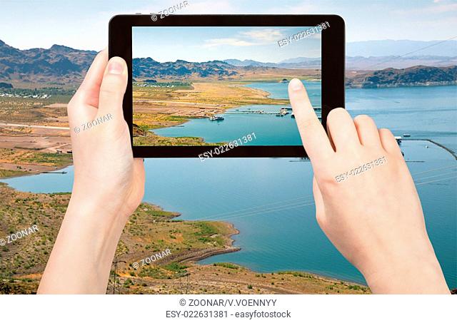 tourist taking photo of Lake Mead in Nevada