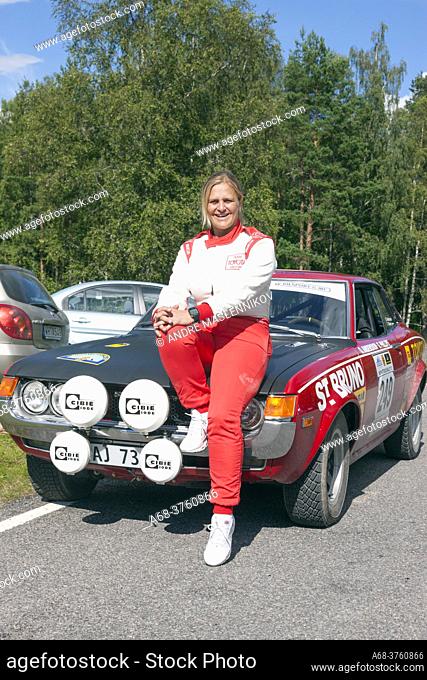 Rally driver Tina Turner poses at her Toyota during the Midnight Sun Rally 2012-07-19. Bockhammar in Västmanland. Sweden