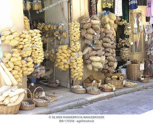 Souvenir shop with natural sponges tourist shopping road Adrianou old town Plaka Athens Greece