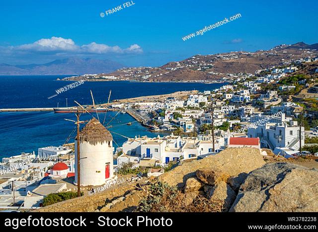 View of whitewashed windmill overlooking town and harbour, Mykonos Town, Mykonos, Cyclades Islands, Greek Islands, Aegean Sea, Greece, Europe