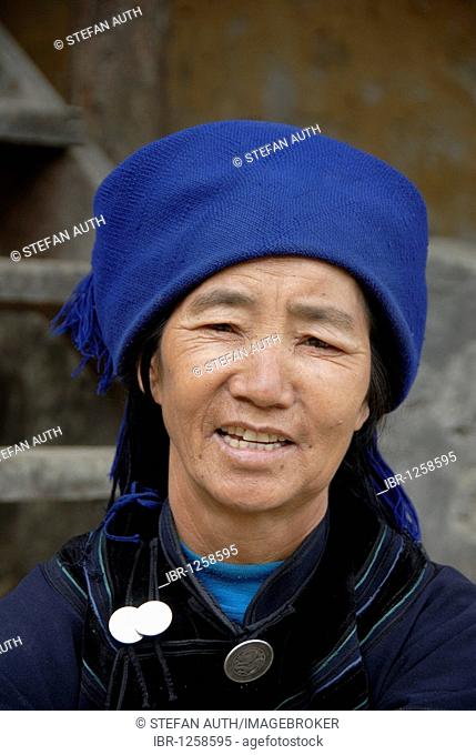 Portrait, ethnology, woman of the Hani ethnic group, dark blue clothes, near Xinji, Yuanyang, Yunnan Province, People's Republic of China, Asia