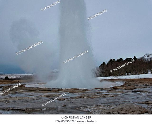 An eruption from the Great Geyser in Iceland with a very high fountain