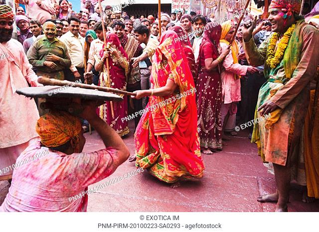People celebrating 'Lath Maar Holi' festival, Barsana, Uttar Pradesh India