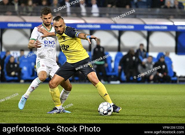 OHL's Siebe Schrijvers and Union's Teddy Teuma fight for the ball during a soccer match between Oud-Heverlee Leuven and Royale Union Saint-Gilloise