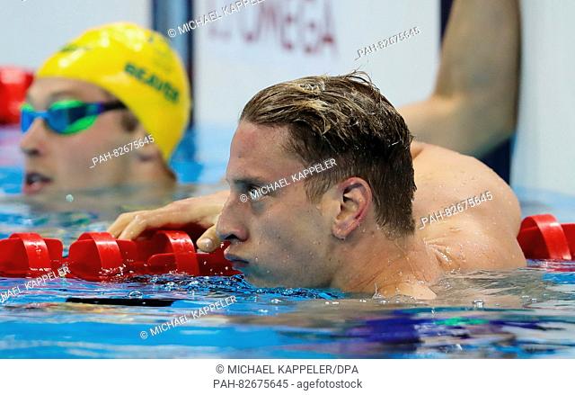 Jan-Philip Glania of Germany reacts after the Men's 200m Backstroke Semifinal of the Swimming events of the Rio 2016 Olympic Games at the Olympic Aquatics...