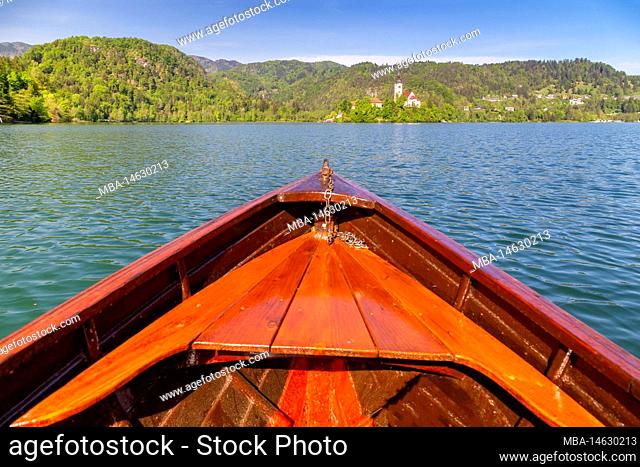View of Bled church and island on Lake Bled from a typical boat. Bled, Upper Carniola, Slovenia