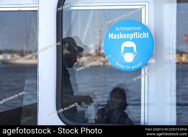 13 August 2020, Mecklenburg-Western Pomerania, Stralsund: The excursion ship Altefähr enters the harbour. Tourists can take a harbour tour through the...