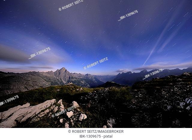 Mountain range under a full moon and star trails, Hinterhornbach, Lechtal, Ausserfern, Tyrol, Austria, Europe