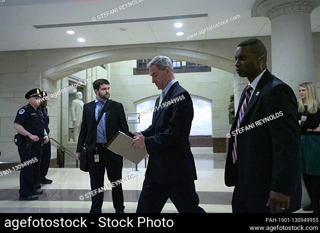 Acting Director of the United States Citizenship and Immigration Services Ken Cuccinelli leaves the CVC Auditorium at the United States Capitol in Washington D