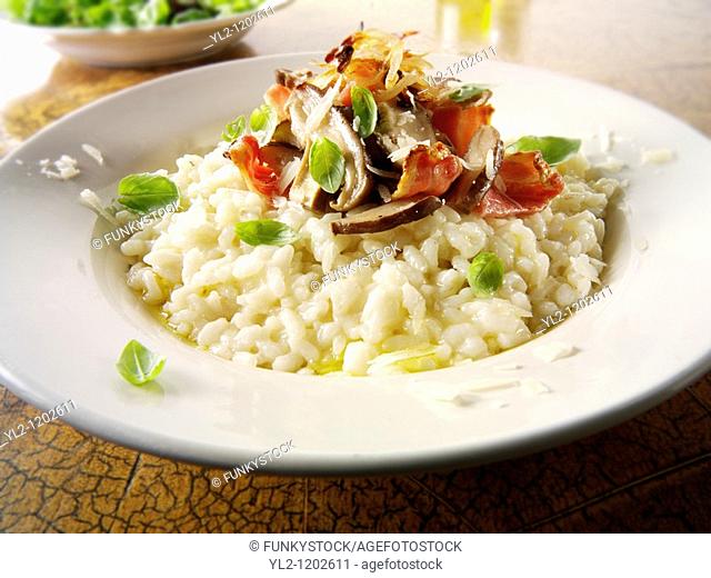 Classic risotto with wild porcini mushrooms and bacon