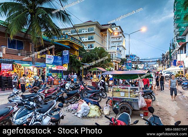 Cambodia, Sihanoukville, street view by Serendipity Pier, dusk
