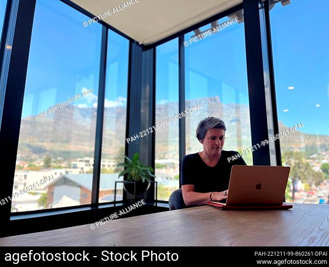 PRODUCTION - 03 November 2022, South Africa, Kapstadt: Christina Leitner works on her laptop in an office in Cape Town. She has been living as a digital nomad...