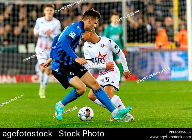 Club's Andreas Skov Olsen and Seraing's Sami Lahssaini fight for the ball during a soccer match between Club Brugge KV and RFC Seraing