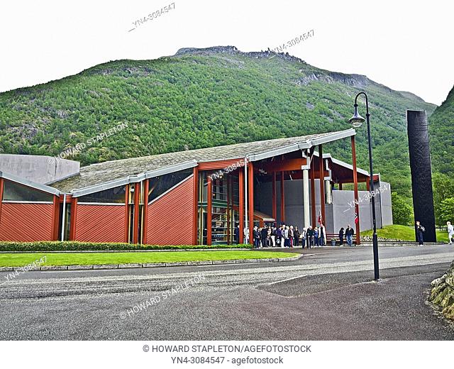 A crowd of people wait to enter the museum at the Hardangervidda Nature Center near Eidfjord, Norway