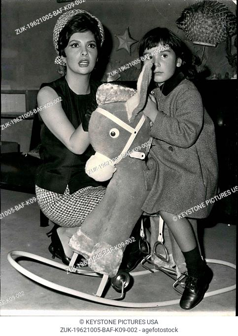Oct. 05, 1962 - A young Parisian girl gave Gina Lollobrigida a little rocking donkey for her son Milko. (Credit Image: © Keystone Press Agency/Keystone USA via...