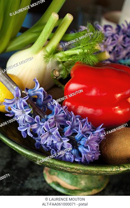 Assorted vegetables and fruits with freshly cut hyacinth