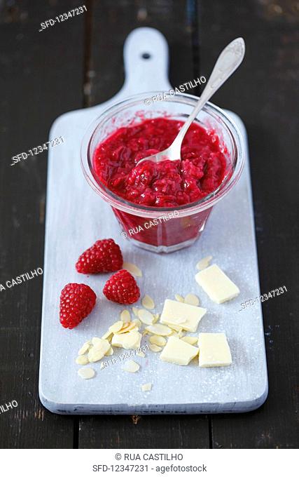 Homemade raspberry jam with white chocolate and almonds