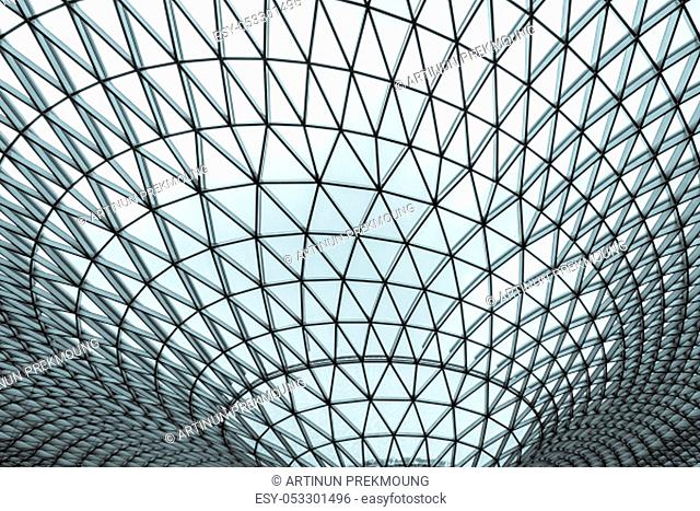 Glass and steel building with triangle pattern structure. Futuristic architecture. Neo-futurism architectural style. White triangle geometric dome texture