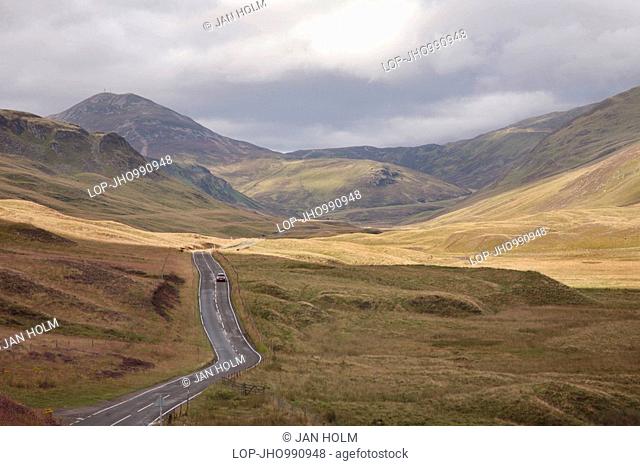 Scotland, Perth and Kinross, Glenshee, A car travelling along the Glenshee Pass