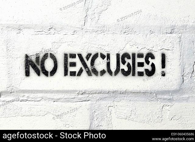 no excuses exclamation stencil print on the white brick wall