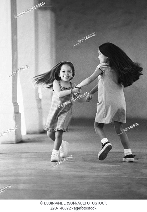 Two playful little girls