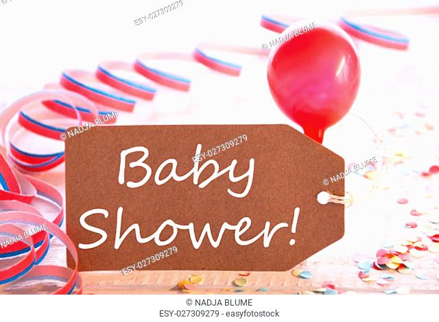 One Label With English Text Baby Shower. Party Decoration Like Streamer, Confetti And Balloon. Wooden Background With Vintage, Retro Or Rustic Syle