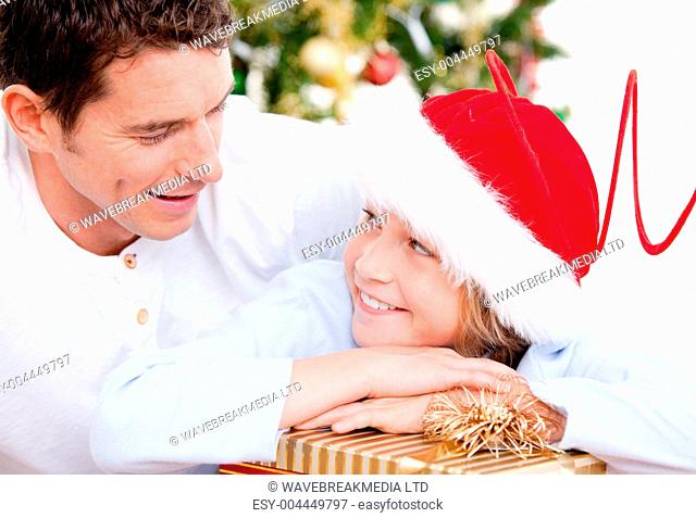 Attractive father celebrating christmas with his son