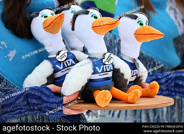 26 February 2023, Slovenia, Planica: Nordic skiing: World Championship: combined, team, mixed, normal hill, jump, World Championship mascot Vita are ready on a...