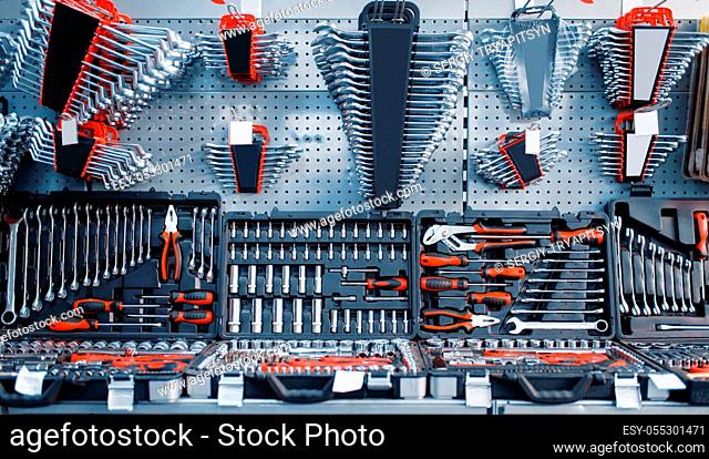 Toolboxes and kits in tool store closeup, nobody, ratchet heads. Choice of equipment in hardware shop, professional instrument in supermarket