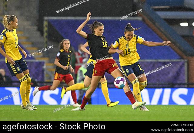 Belgium's Marie Minnaert and Sweden's Johanna Rytting Kaneryd fight for the ball during a game between Belgium's national women's soccer team the Red Flames and...
