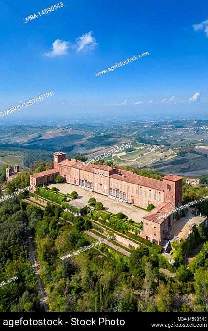 Aerial view of the castle and vineyards of Montalto Pavese. Montalto Pavese, Oltrepo Pavese, Province of Pavia, Lombardy, Italy