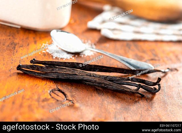 Vanilla pods. Sticks of vanilla with white sugar