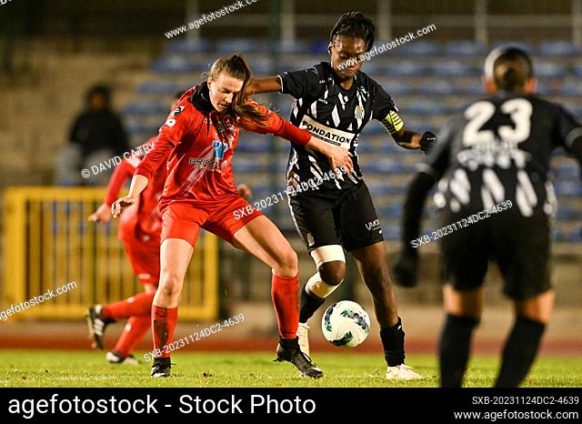 Lies Bongaerts (21) of Woluwe pictured fighting for the ball with Francesca Lueya (8) of Charleroi during a female soccer game between FC Femina White Star...