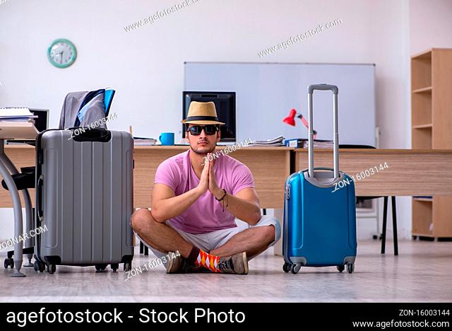 Young employee preparing for the trip