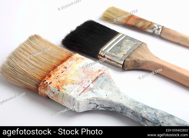 Three brush against white background