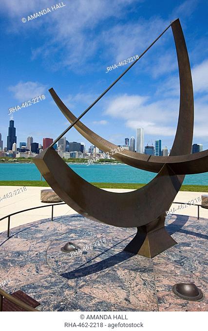 Sundial sculpture at the Adler Planetarium sundial and city skyline, Chicago, Illinois, United States of America, North America
