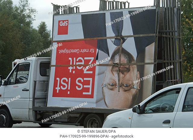 A SPDÂ election campaign poster that is no longer needed is transported on a truck in Ribnitz-Damgarten, Germany, 25 September 2017