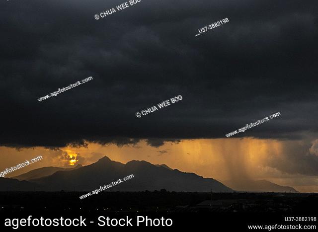 Sunset and stormy weather over Gunung Serapi, Matang, Sarawak, East Malaysia