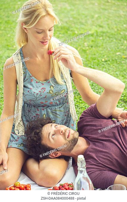 Couple having picnic together