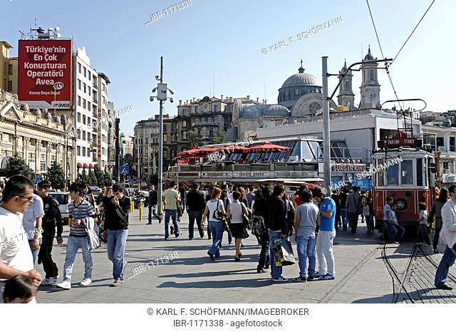 Taksim Square, historic tram, crowded with people, Beyoglu, Istanbul, Turkey