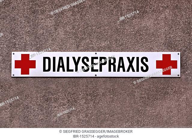Sign on a facade, Dialysepraxis, German for medical practice for dialysis treatment with red crosses