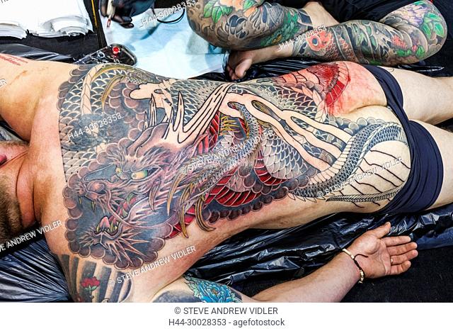 England, London, London Tattoo Convention, Tattoo Detail Showing Chinese Dragon