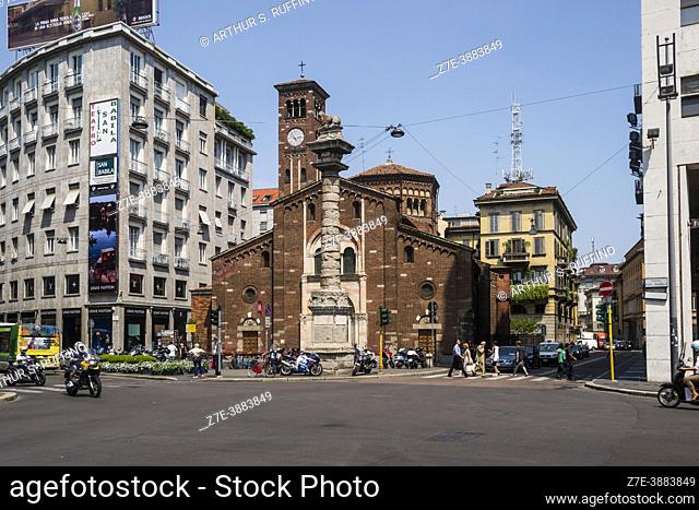 Saint Babylas Church (Chiesa di San Babila) with bell/clock tower and column with lion. Piazza San Babila, Milan, Lombardy, Italy, Europe