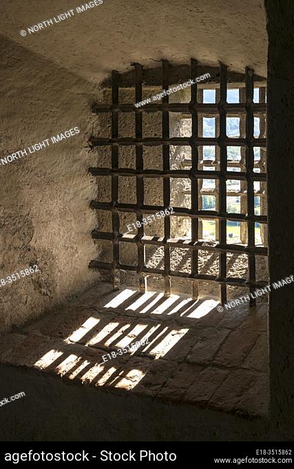 Austria, Salzburg, Hohensalzburg Castle. Heavily barred window, in the fortress of Salzburg