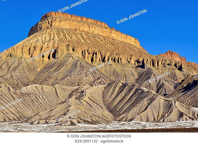 Melting snow on eroded butte, near Grand Junction, Colorado, USA
