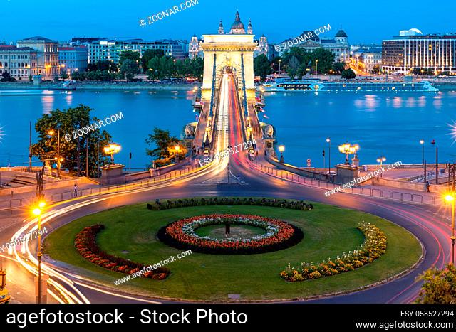 Budapest chain bridge in dusk with traffic lights, long exposure photo