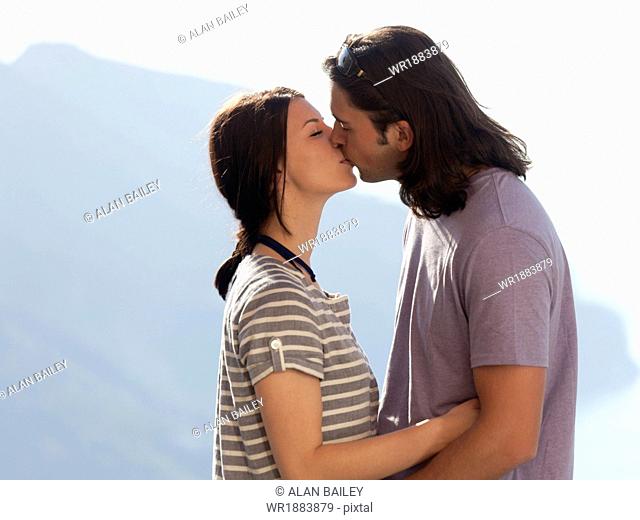 Italy, Amalfi Coast, Ravello, Young couple kissing